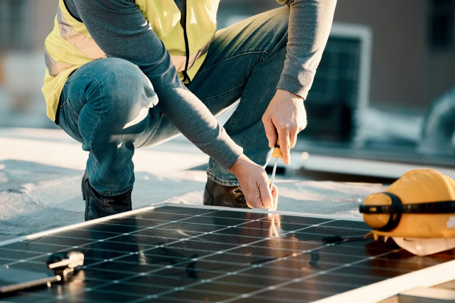 Solar panel, screwdriver and industrial worker hands with tools for renewable energy and electricit